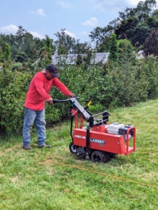 Next, Pete goes over the designated beds with our new Classen Pro HSC18 sod cutter. The sod cutter goes over the area smoothly and deeply. Everything must be done as precisely as possible for the maze.