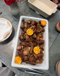 Carnitas, literally meaning "little meats", is a dish of Mexican cuisine that originated in the state of Michoacán. Carnitas are made by braising or simmering pork in oil or lard until tender.