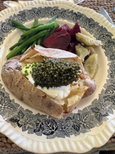 Our main course included russet potato baked, smashed, and served with creme fraiche, chives and caviar, roasted beet salad, green string beans, and braised artichoke hearts. All the vegetables were picked fresh from my gardens.