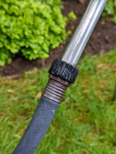 The hose connects easily to the sprinkler directly under the sprinkler head so it is well-balanced and won't tip over when in use.