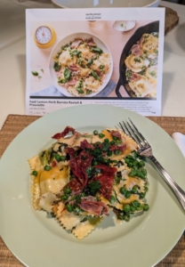 The ravioli is plated and topped with some of the remaining prosciutto and mint and it's ready to enjoy. Our ravioli looks perfect - just like the photo. And it's so delicious. Sign up for Martha Stewart & Marley Spoon today and enjoy these dishes with us.