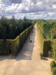 Today, to keep up with the planting of hundreds of thousands of specimens each year, including the regular maintenance tasks of grooming, pruning, edging, and cleaning, Versailles employs 48-full time gardeners. This is one of the many "walks" - a hedge allée from one area to another. André Le Nôtre organised the Gardens of Versailles around two axes, north-south and east-west.