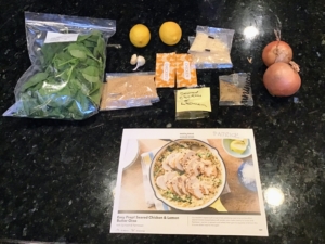 At Patrick's home, here are all the ingredients for the Seared Chicken & Lemon Butter Orzo with Spinach & Parmesan - always with a large recipe card that can be saved and used again.