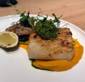This is the Miso Cod with glazed carrot purée, oyster mushrooms, coriander-toasted almond salsa.