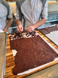 Inside the kitchen, Cédric's team works efficiently to make all the pastries and other confections. He says by the time the doors open, the pastries are already made.