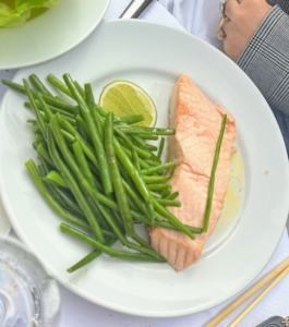 And a flavorful steamed salmon fillet with fresh green beans.