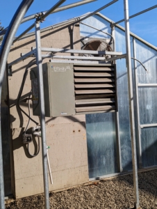 At the back of each greenhouse is a high efficiency Modine boiler and heater. I wanted the greenhouses to have both cold and tempered water for the plants.
