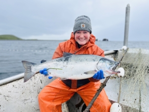This large salmon is an Alaska coho salmon weighing about 15-pounds. As an Alaska fisherman, Hannah understands the importance of knowing where the seafood comes from. She dedicates her time to ensuring wild caught seafood is available for future generations. (Photo courtesy of Hannah Heimbuch)