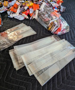 I like to group several candies together and place them in cellophane bags. These bags are available online and can be so helpful for gifting an array of small items.