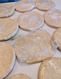 Here are several chilled pâte brisée discs. Pâte brisée is the French version of classic pie or tart pastry. It is a versatile all-butter dough for both sweet and savory recipes—from apple pie to quiche.