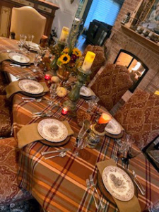 This table was set by Catherine Sharkey Steinberg from Riverwoods, Illionois. She writes, it includes "transferware plates I collected 25-years ago. I used some blankets set on the diagonal instead of tablecloths."