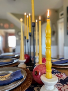 Katie Alvarez sent me this photo. She says, "hoping this table inspires others to enjoy the simple beauty of beeswax candles at their holiday gatherings this season. On this table is an antique Wilton Armetale pewter and folk art runner with beeswax tapers by Appalachian Wax Works handcrafted in Maryland."