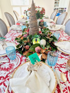 Jen Potter shares this festive photo of her holiday table. Jen "runs a tiny home brand called @fetehome and designs patterns and applies them to table and home décor like the tablecloth.