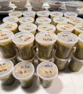 I estimated 44-plastic containers, and we filled just under 44-quarts in all! Each lid is marked with the contents and the date it was prepared. If planning to freeze, only fill up to the first line around the container so it has room to expand.