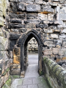 This is one of the smaller arched doorways on the grounds of the cathedral. During the Reformation, when the structure was ransacked in 1559, the entire interior was destroyed and then abandoned by 1561. It wasn't until 1826, when efforts started to preserve the building and the surrounding walls.