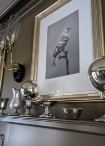 On my Brown Room mantel, large silver balls atop candleholders. Decorations can be subtle and still so festive.