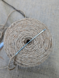 To sew the burlap, we use jute twine. It is all natural and the same color as the burlap. We also use five-inch and eight-inch long craft needles specifically made for working with jute.