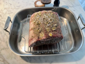 Operations manager, Matt Krack, cooked a rib roast for Christmas diner with his sons. His recipe: dress it with herbs, salt and garlic, cook low and slow at 225-degrees Fahrenheit for 2.5 hours, let it rest for 45-minutes, turn the heat up to 550-degrees Fahrenheit, roast for 10-minutes. Here is the before...