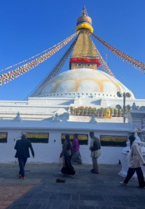 Boudhanath is a stupa in Kathmandu, Nepal. In Buddhism, a stupa is a mound-like or hemispherical structure containing relics that is used as a place of meditation. This stupa is one of the largest spherical stupas in Nepal and the world.