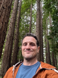 My head gardener, Ryan McCallister, went home for the holidays - home to California. Here he is visiting the Redwood Grove at the UC Botanical Garden. These redwoods, Sequoia sempervirens, towering over the lush woodland floor were planted in the 1930s.