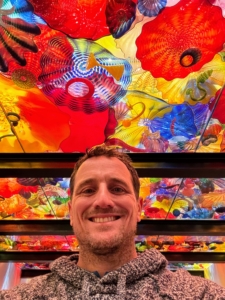 Here is Ryan in one of the indoor galleries under another stunning and colorful Chihuly installation, Oklahoma Persian Ceiling, 2002. Dale Chihuly has created more than 2,000 works of art. His work is displayed in more than 200 museums worldwide and in 100 public gardens, parks, and botanical gardens.