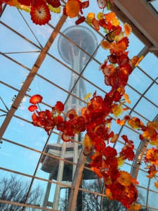 Chihuly Garden and Glass is adjacent to the iconic structure. Here it can be seen from the Glasshouse, a 40-foot tall, glass and steel structure covering 4,500 square feet of light-filled space.