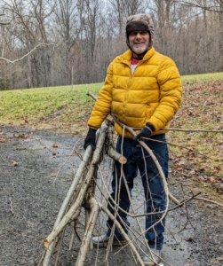 And here is Fernando hauling away some of the branches. Fernando has been working with me for 30-years and helps in so many different ways here at the farm.