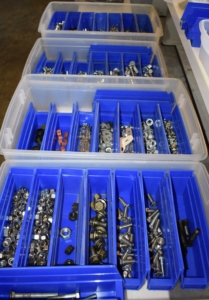 In my Equipment Barn closet, we keep washers, nuts, and bolts carefully stored in these trays and then in large plastic bins - always organized by type.