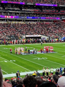 I love attending this event - the excitement of the crowds and the action on the field, from the battling NFL teams to the halftime entertainment. It's a fun time every year. The 49ers are in white and gold and the Chiefs are in red.