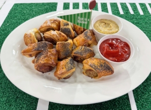 Everybody loves Pigs in a Blanket. Here's my rendition made with sausage. I called them "Brockwursts" after you know who... Brock Purdy, the quarterback for the San Francisco 49ers. One can use any fully cooked sausages, such as frankfurters, andouille, or chicken sausages - I used my Good Things seal of approval Brats from Schaller and Weber.