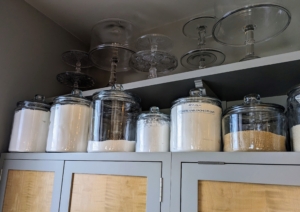In my own Winter House kitchen, I keep flour and rice in these glass jars with wide mouths, so measuring cups and scoops can fit inside.