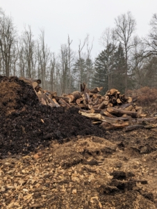 There is also a pile of horse and chicken waste that gets mixed with the fine wood chips. Do you know the difference between compost and mulch? Compost and mulch are often used synonymously; however, there is a big difference between the two. Compost is biologically active material that breaks down from organic matter. Mulch, on the other hand, is any material, organic or inorganic, that covers a given soil surface.