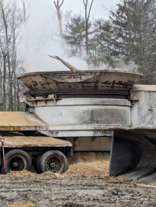 Tub grinders rely primarily on gravity to feed the material into the hammermill at the bottom of the tub. As the tub revolves, the hammermill below, shatters the wood into smaller fragments.