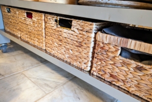 Underneath a counter, I house often-used pet supplies in these woven rattan boxes. Items inside are hidden from view, but can be accessed quickly when needed.