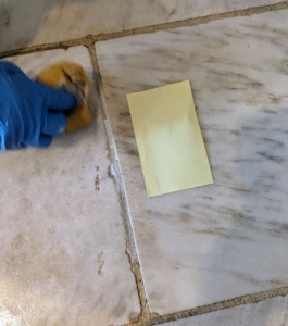 Any excess is easily wiped away. I also removed any grout that accidentally got on the marble.
