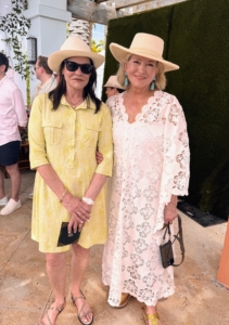 The next day, I hosted a garden luncheon. Here I am with Audrey Oswell, President and Managing Director of Atlantis Paradise Island. I am wearing an Oscar de la Renta dress.