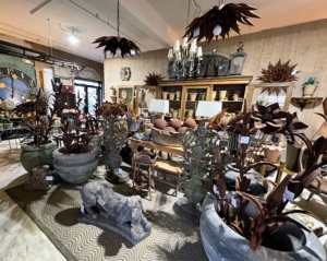 I am always on the lookout for interesting furniture and accessories. Whenever I have time, I enjoy antiquing and scouring area shops. Not long ago, I was at the Antique and Artisan Gallery in Stamford, Connecticut. Look closely and see what I spotted right in the center of the photo...
