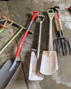 Meanwhile, all of the garden tools are rinsed clean.