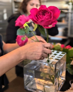 The stems are placed one by one into the vase. Always make sure the stems are sitting in fresh water to ensure they stay hydrated and protected from bacteria buildup. And try to replace the water in the vase daily, as the cleaner the water the longer the lifespan of the arrangement and the flowers.