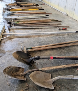 The hand tools are also taken off their hooks, inspected, and grouped with other like pieces.
