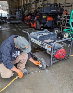 Chhiring makes sure each piece of equipment is in perfect working order. Here he is checking the tires of a generator.