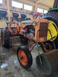 I keep this vintage Allis-Chalmers tractor from the 1940s in this barn also. It reminds us how much these farm pieces have evolved over the years.
