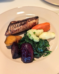 The cod is served with roasted beets, sautéed spinach, fingerling potatoes, and carrot-ginger purée. It was such a delicious combination of fish and vegetables.