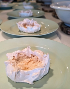 ... Just a little keeps the meringue nest in place. Then, the nest is filled with a creamy lemon curd.