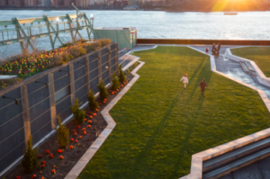 This is historic Pier 57. The public rooftop, with its incredible views of Little Island and New York Harbor, opened in 2022. (Photo courtesy of HudsonRiverPark.org)