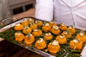 Some of the hors d'oeuvres passed around to guests included these Jumbo Lump Crab Cakes with Tartar Sauce. (Photo by Gaby Duong)
