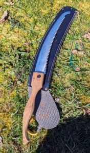 This is one of Matt's trusted pruning saws. He actually makes his own saw handles for his favorite blades. This blade has a slightly curved tip, so branches can be pulled out more easily.