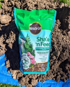 We use Miracle-Gro® Shake 'N Feed Flowering Trees and Shrubs Plant Food, which contains natural ingredients to feed microbes in the soil and provides continuous release feeding for up to three months.