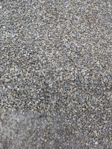 I like to use native washed stone in a blend of gray tones. This gravel is used all over the farm.