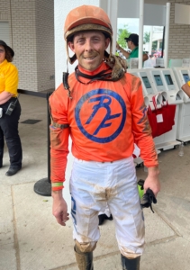 This jockey is Ben Curtis who rode Honor Marie, a three-year old colt.